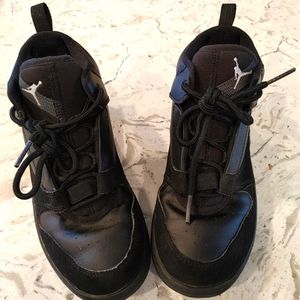 Boys Nike Air Jordans black on black